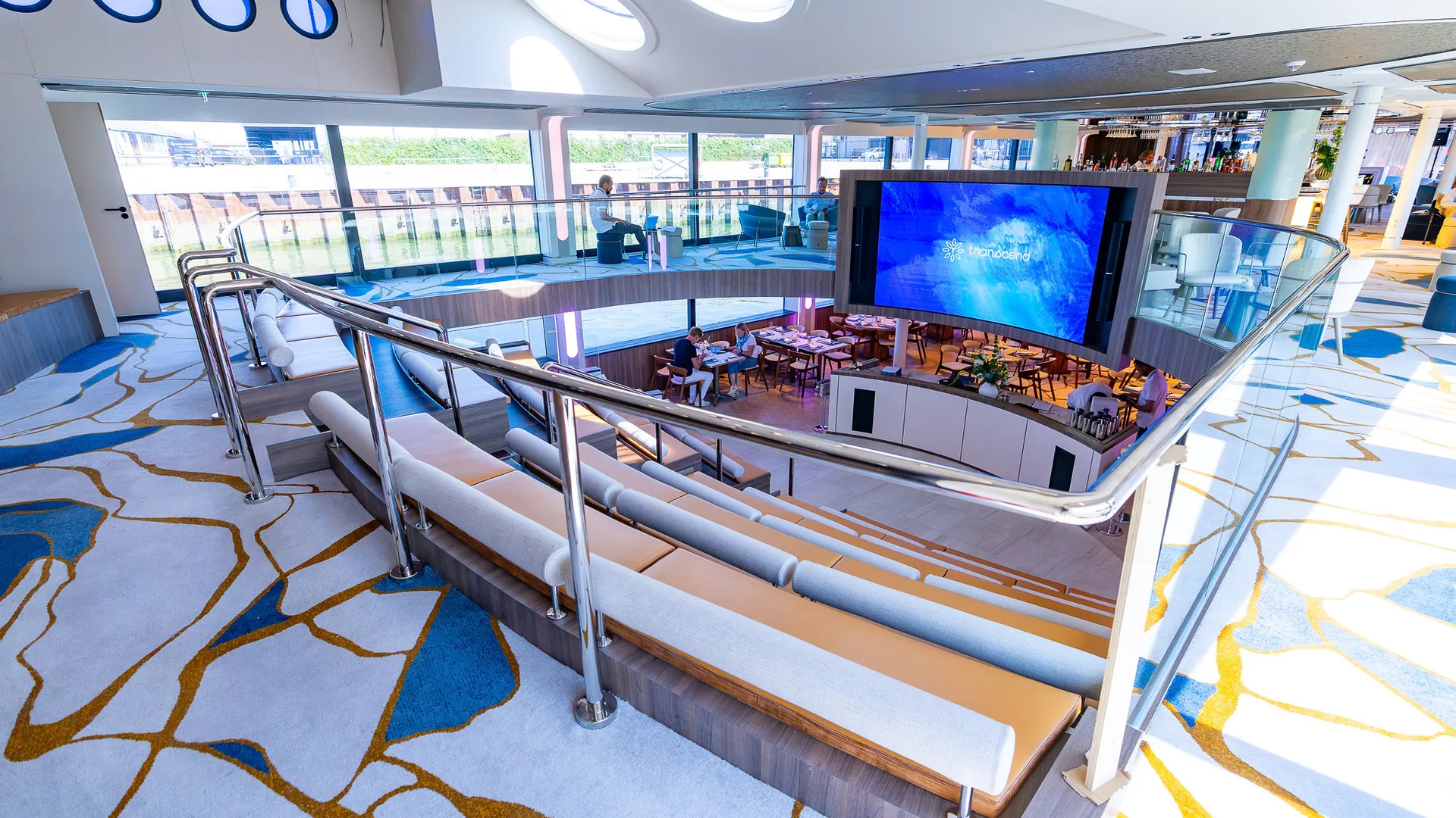 The Forum aboard Transcend Connect set with tables
